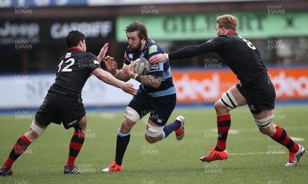 010315 - Cardiff Blues v Edinburgh Rugby, Guinness PRO12 -Cardiff Blues Josh Turnbull takes on Edinburgh's Phil Burleigh and Edinburgh's David Denton