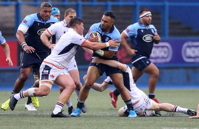 051019 - Cardiff Blues v Edinburgh Rugby - Guinness PRO14 - Willis Halaholo of Cardiff Blues is tackled by Pietro Ceccarelli and George Taylor of Edinburgh