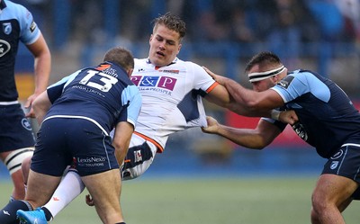 051019 - Cardiff Blues v Edinburgh Rugby - Guinness PRO14 - Duhan van der Merwe of Edinburgh is tackled by Garyn Smith and Liam Belcher of Cardiff Blues