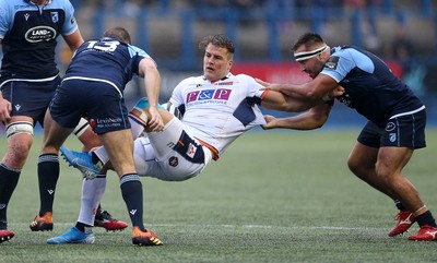 051019 - Cardiff Blues v Edinburgh Rugby - Guinness PRO14 - Duhan van der Merwe of Edinburgh is tackled by Garyn Smith and Liam Belcher of Cardiff Blues