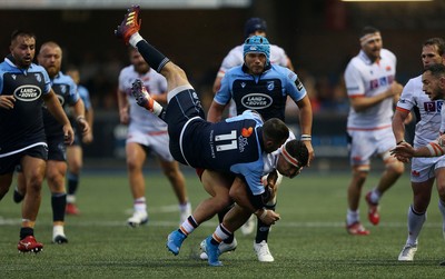 051019 - Cardiff Blues v Edinburgh Rugby - Guinness PRO14 - Matthew Morgan of Cardiff Blues goes over Damien Hoyland of Edinburgh