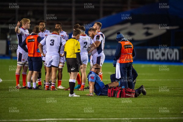220321 - Cardiff Blues v Edinburgh - Guinness PRO14 - Dmitri Arhip of Cardiff Blues is treated by physio for an injury