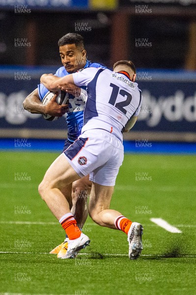 220321 - Cardiff Blues v Edinburgh - Guinness PRO14 - Rey Lee-Lo of Cardiff Blues is tackled by George Taylor of Edinburgh