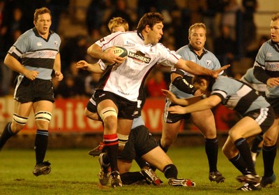 280105 - Cardiff Blues v Edinburgh - Celtic League - Edinburgh's Nathan Hines tries to get through