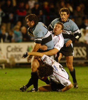 280105 - Cardiff Blues v Edinburgh - Celtic League - Blues' Tristan Davies tries to get through