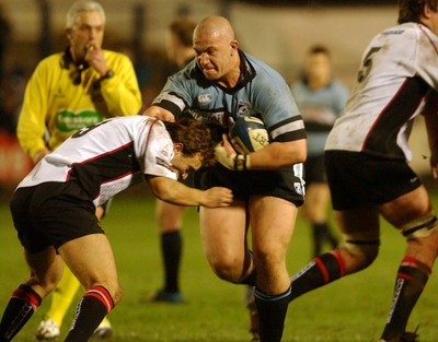 280105 - Cardiff Blues v Edinburgh - Celtic League - Blues' John Yapp tries to get past Mike Blair