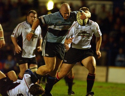 280105 - Cardiff Blues v Edinburgh - Celtic League - Blues John Yapp is tackled by Mike Blair