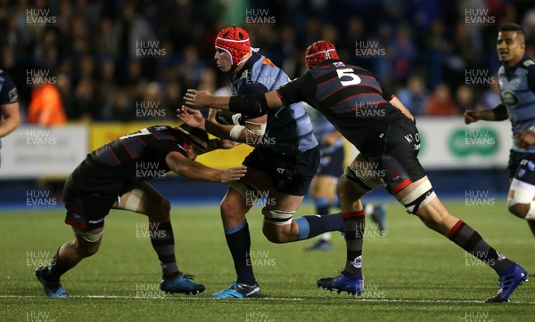 010917 - Cardiff Blues v Edinburgh Rugby - Guinness PRO14 - Seb Davies of Cardiff Blues is tackled by John Hardie and Grant Gilchrist of Edinburgh