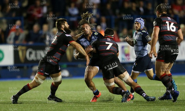 010917 - Cardiff Blues v Edinburgh Rugby - Guinness PRO14 - Sion Bennett of Cardiff Blues is tackled by Cornell du Preez and John Hardie of Edinburgh