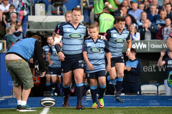 010917 - Cardiff Blues v Edinburgh - Guinness PRO14 - Matthew Rees of Cardiff Blues walks out with mascot