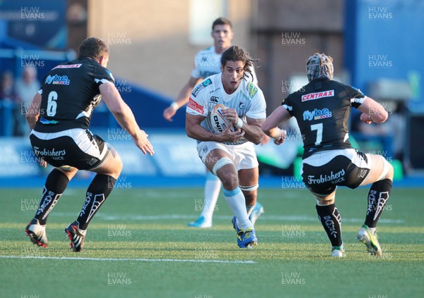 150814 - Cardiff Blues v Exeter - Pre Season Friendly - Josh Navidi of Cardiff Blues is tackled by David Ewers and Sam Simmonds of Exeter Chiefs 