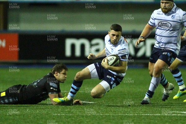 160219 - Cardiff Blues v Glasgow Warriors - GuinnessPRO14 - Aled Summerhill of Cardiff Blues is tackled by George Turner of Glasgow