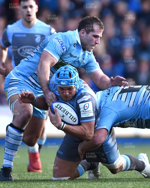 211018 - Cardiff Blues v Glasgow Warriors - European Rugby Champions Cup - Olly Robinson of Cardiff Blues is tackled by  Fraser Brown and D’Arcy Rae of Glasgow Warriors