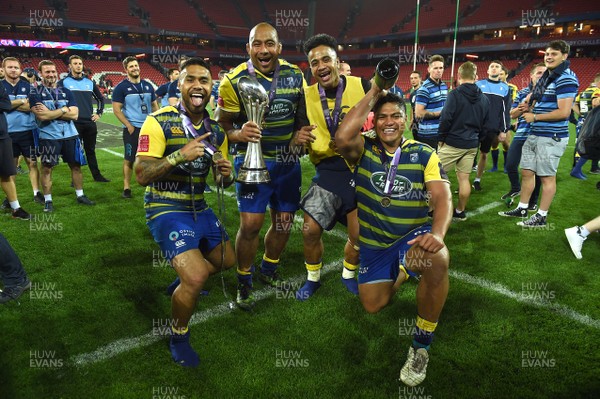 110518 - Cardiff Blues v Gloucester - European Rugby Challenge Cup Final - Willis Halaholo, Taufa'ao Filise, Rey Lee-Lo, Nick Williams of Cardiff Blues celebrate