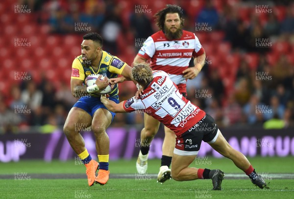 110518 - Cardiff Blues v Gloucester - European Rugby Challenge Cup Final - Willis Halaholo of Cardiff Blues is tackled by Callum Braley of Gloucester