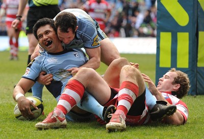 14.03.10 - LV= Cup Rugby, semi final. Cardiff Blues v Gloucester Rugby Blues' Casey Lualua is congratulated by \Gareth Cooper after scoring try as Gloucester's James Simpson Daniel looks on 