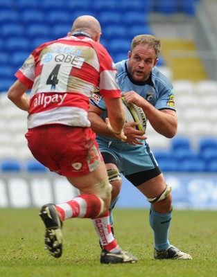 14.03.10 - LV= Cup Rugby, Cardiff Blues v Gloucester Rugby Blues' Xavier Rush looks for a way past Gloucester's Will James 