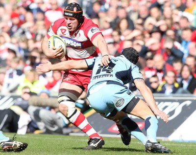 14.03.10 ... Cardiff Blues v Gloucester, LV= Cup Semi Final -  Gloucester's Peter Buxton takes on Blues' Tom James  