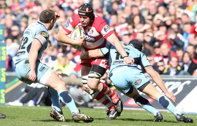 14.03.10 ... Cardiff Blues v Gloucester, LV= Cup Semi Final -  Gloucester's Peter Buxton takes on Blues' Tom James  