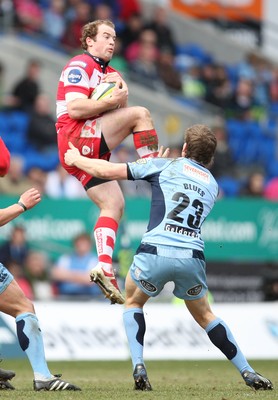 14.03.10 ... Cardiff Blues v Gloucester, LV= Cup Semi Final -  Gloucester's James Simpson-Daniel takes the ball as Blues' Gavin Evans closes in 