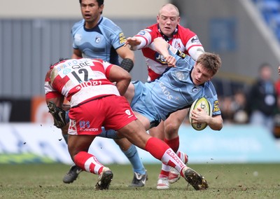 14.03.10 ... Cardiff Blues v Gloucester, LV= Cup Semi Final -  Blues' Ben Blair is tackled by Gloucester's Eliota Fuimaono-Sapolu 