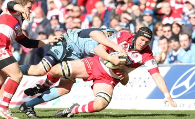 14.03.10 ... Cardiff Blues v Gloucester, LV= Cup Semi Final -  Gloucester's Adam Eustace is tackled by Blues' Paul Tito   