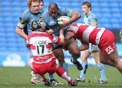 14.03.10 ... Cardiff Blues v Gloucester, LV= Cup Semi Final -  Blues' Faao Filise tries to drive through Gloucester's Alasdair Dickinson  