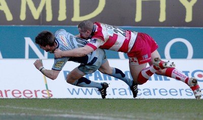 14.03.10 ... Cardiff Blues v Gloucester, LV= Cup Semi Final -  Blues' Ceri Sweeney beats Gloucester's Tim Molenaar to score try   