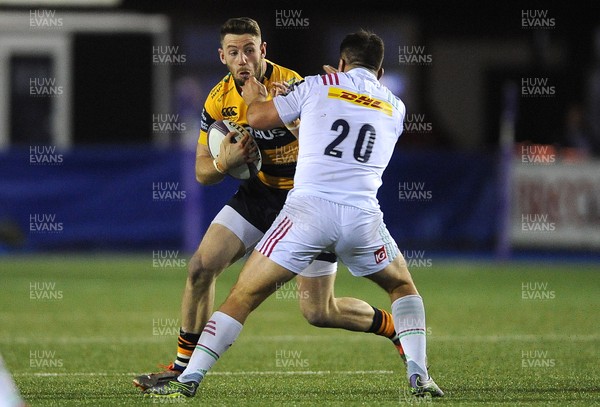 191115 - Cardiff Blues v Harlequins - European Rugby Challenge Cup -Alex Cuthbert of Cardiff Blues is tackled by Dave Ward of Harlequins