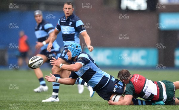110818 - Cardiff Blues v Leicester Tigers - Preseason Friendly - Olly Robinson of Cardiff Blues gets the ball away