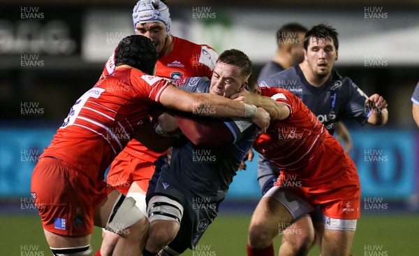 231119 - Cardiff Blues v Leicester Tigers, European Challenge Cup - Will Boyde of Cardiff Blues is tackled by Harry Wells of Leicester Tigers