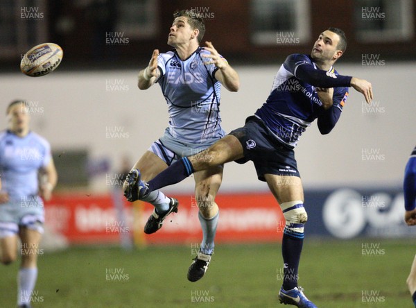 080213 - Cardiff Blues v Leinster, RaboDirect PRO12 - Cardiff Blues' Gavin Evans and Leinster's Dave Kearney compete for the ball