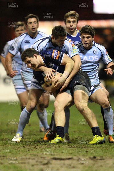 080213 - Cardiff Blues v Leinster, RaboDirect PRO12 - Leinster's Darren Hudson is held by Cardiff Blues' Jason Tovey