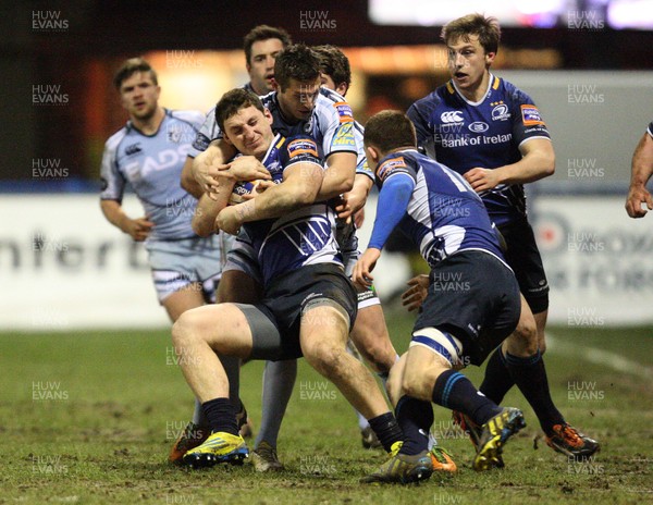 080213 - Cardiff Blues v Leinster, RaboDirect PRO12 - Leinster's Darren Hudson is held by Cardiff Blues' Jason Tovey