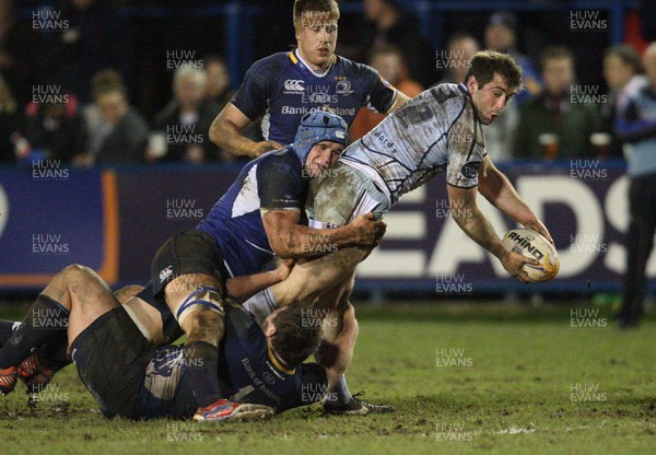 080213 - Cardiff Blues v Leinster, RaboDirect PRO12 - Cardiff Blues' Dafydd Hewitt looks for support as he is tackled