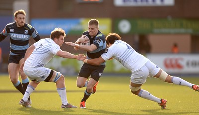 100115 - Cardiff Blues v Leinster - Guinness PRO12 -Gareth Anscombe of Cardiff Blues is tackled by Jordi Murphy and Tom Denton of Leinster