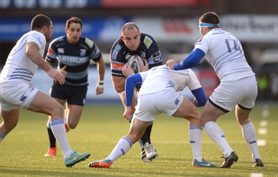 100115 - Cardiff Blues v Leinster - Guinness PRO12 -Lou Reed of Cardiff Blues is tackled by Noel Reid of Leinster