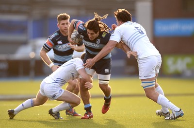 100115 - Cardiff Blues v Leinster - Guinness PRO12 -Josh Navidi of Cardiff Blues is tackled by Luke McGrath and Kane Douglas of Leinster