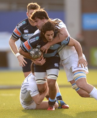 100115 - Cardiff Blues v Leinster - Guinness PRO12 -Josh Navidi of Cardiff Blues is tackled by Luke McGrath and Kane Douglas of Leinster