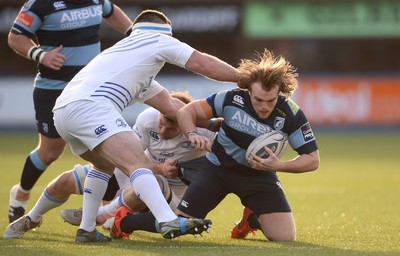 100115 - Cardiff Blues v Leinster - Guinness PRO12 -Kristan Dacey of Cardiff Blues is tackled by Jordi Murphy of Leinster