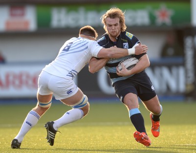 100115 - Cardiff Blues v Leinster - Guinness PRO12 -Kristan Dacey of Cardiff Blues is tackled by Dominic Ryan of Leinster