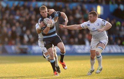 100115 - Cardiff Blues v Leinster - Guinness PRO12 -Gareth Anscombe of Cardiff Blues is tackled by Dominic Ryan and Sean Cronin of Leinster