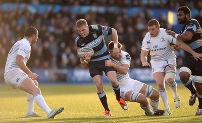 100115 - Cardiff Blues v Leinster - Guinness PRO12 -Gareth Anscombe of Cardiff Blues is tackled by Dominic Ryan of Leinster