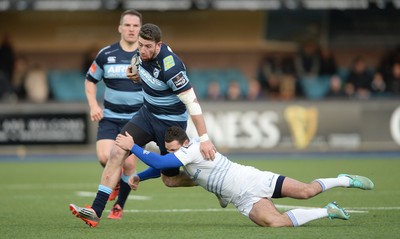 100115 - Cardiff Blues v Leinster - Guinness PRO12 -Alex Cuthbert of Cardiff Blues is tackled by Dave Kearney of Leinster