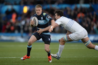 100115 - Cardiff Blues v Leinster - Guinness PRO12 -Gareth Anscombe of Cardiff Blues is tackled by Tom Denton of Leinster