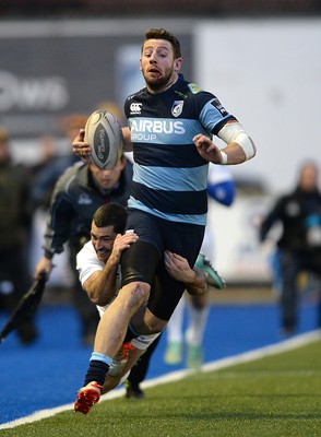 100115 - Cardiff Blues v Leinster - Guinness PRO12 -Alex Cuthbert of Cardiff Blues is tackled by Rob Kearney of Leinster