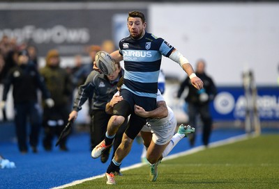 100115 - Cardiff Blues v Leinster - Guinness PRO12 -Alex Cuthbert of Cardiff Blues is tackled by Rob Kearney of Leinster