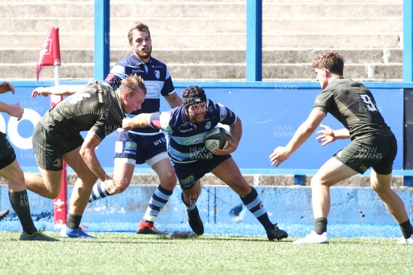 240819 - Cardiff Blues A v Leinster A - Celtic Cup - Alex Knott of Cardiff Blues A takes on Niall Comerford (L) and Cormac Foley of Leinster A  