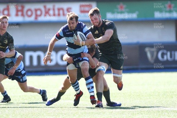 240819 - Cardiff Blues A v Leinster A - Celtic Cup - Dale Stuckey of Cardiff Blues A is tackled by Liam Turner of Leinster A  