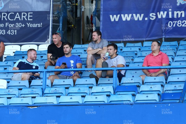 240819 - Cardiff Blues A v Leinster A - Celtic Cup - Head Coach of Cardiff Blues John Mulvihill (R) is joined by his coaching team to oversee Cardiff Blues A